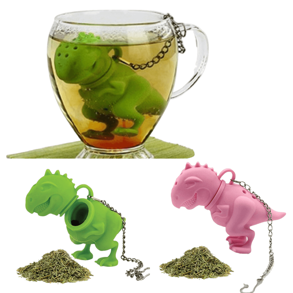 Pink og grøn Dino te-infuser og en kop te.
