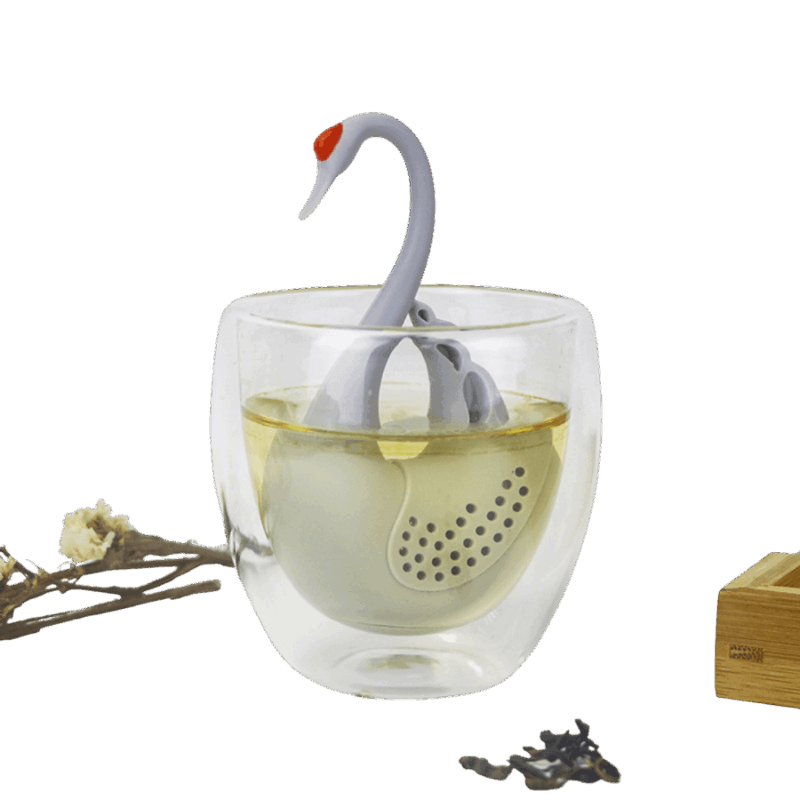 Grå svane teinfuser der står i et glas med vand