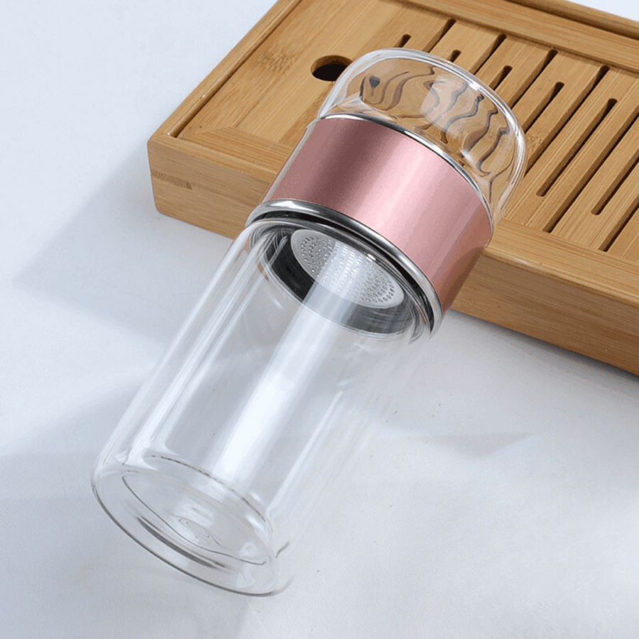 Te glas flaske med te-infuser i Rosa